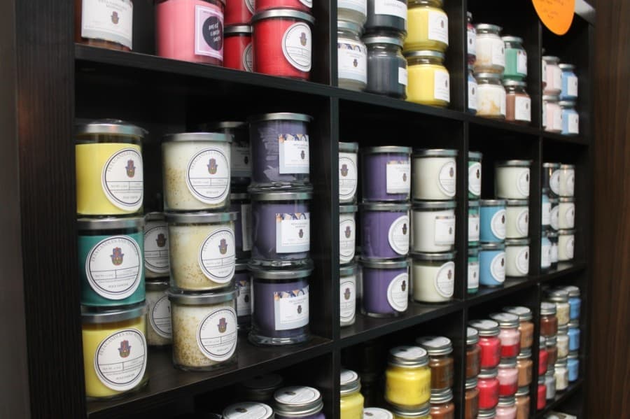 Candles come in 8-ounce, 11-ounce and 22-oz sizes, as well as specialty cake-shaped candles, ranging from one to five. (Colleen Ferguson/Community Impact Newspaper)