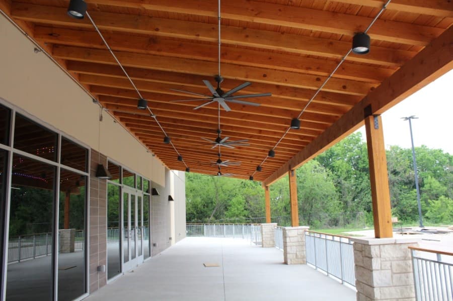 A new outdoor space, equipped with ceiling fans, for guests to hang out. (Megan Cardona/Community Impact Newspaper)