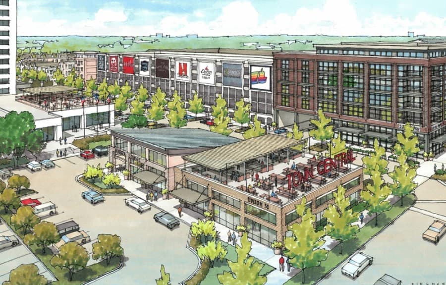 The development's mixed-use buildings will be wrapped around a shared parking garage with open parking for the public and private parking for residents. (Rendering courtesy Catalyst Urban Development)