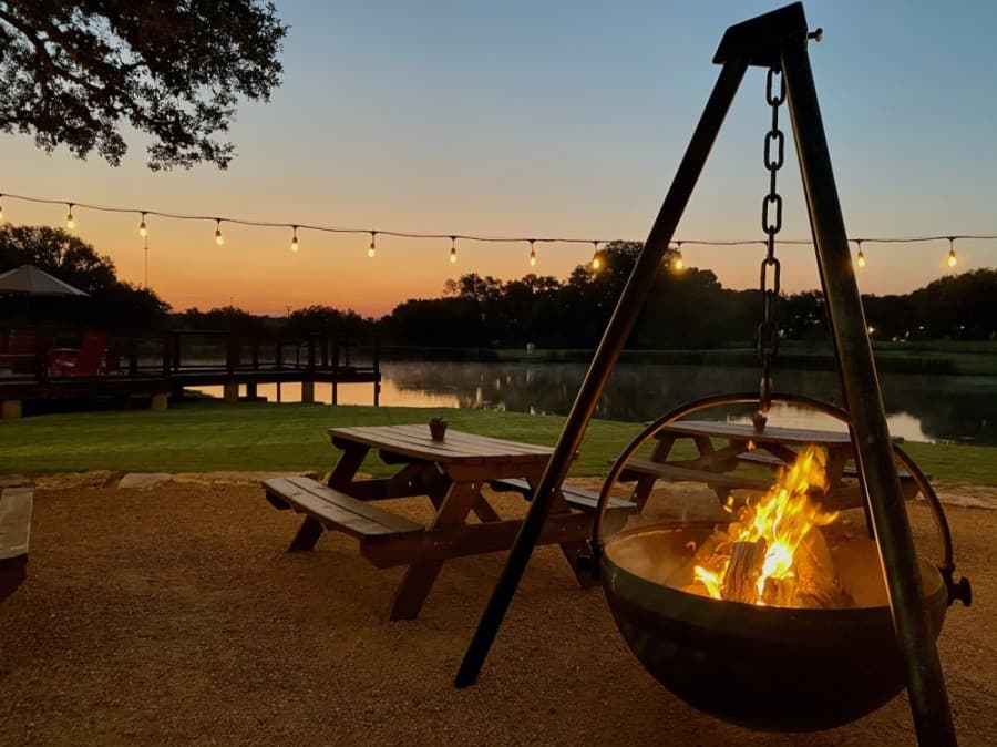 Completed amenities at Driftwood Golf and Ranch Club include a fire pit area and fishing pavilion. (Courtesy Discovery Land Company)
