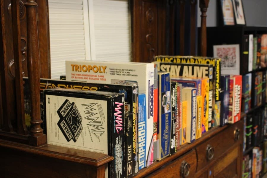 There are more than 400 board games available to play at Battlehops Brewing, including a selection of vintage board games. (Morgan Theophil/Community Impact Newspaper)