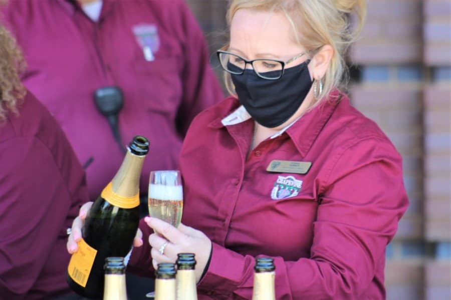 Members of the Grapevine Convention and Visitors' Bureau offered guests refreshments during the event. (Sandra Sadek/Community Impact Newspaper)