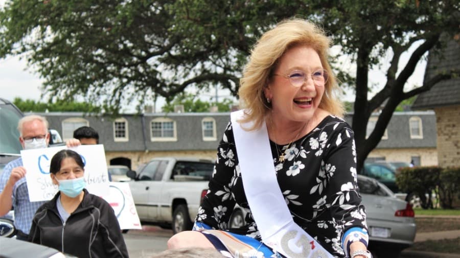 Coworkers hosted a surprise parade for Shirley Roberts prior to the virtual celebration to congratulate her. (Sandra Sadek/Community Impact Newspaper)