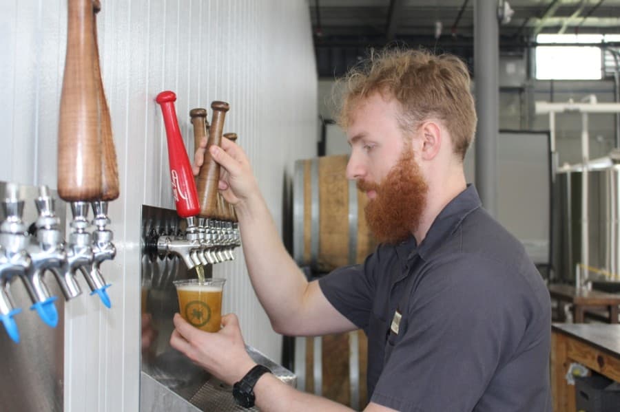 Lead bartender Garrett Turney is a familiar face around Texas Leaguer Brewing. 