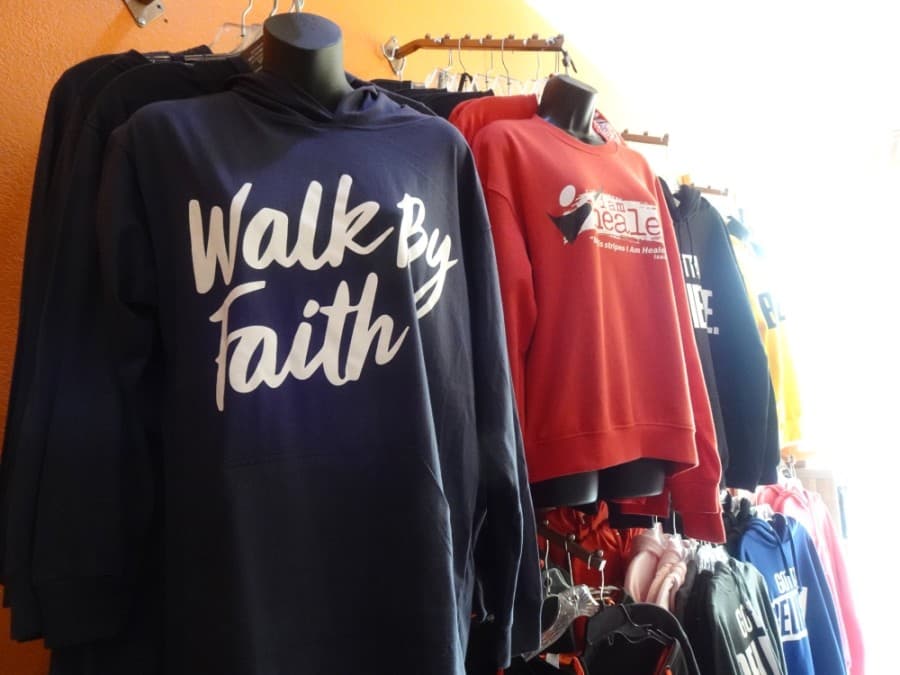 Blessties Christian Apparel sells graphic T-shirts and hoodies with inspirational messaging. (Danica Lloyd/Community Impact Newspaper)