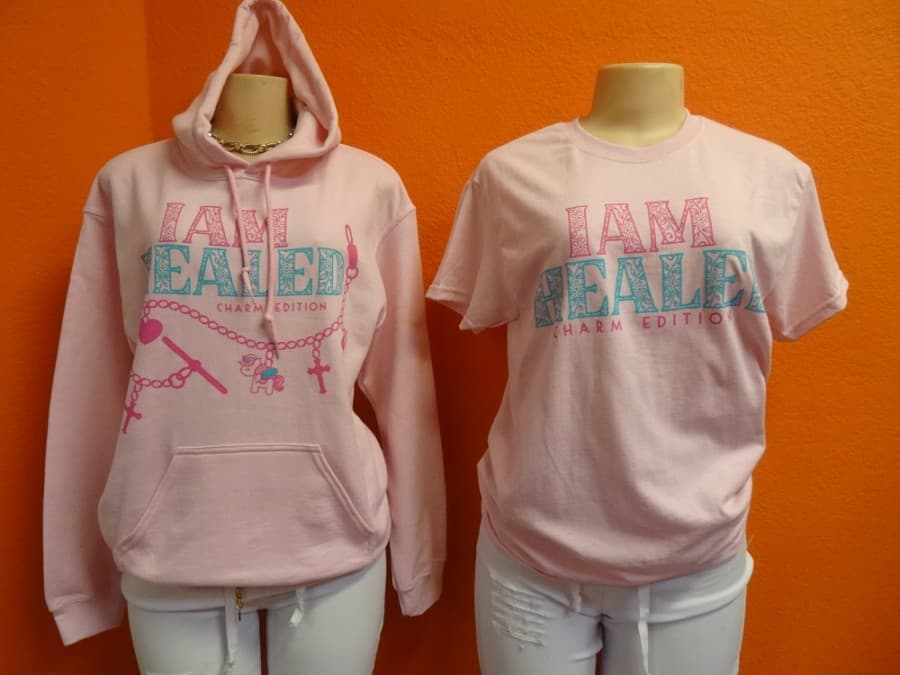 Through the Mom of the Month initiative, each child get their own custom design on a T-shirt and hoodie every month. (Danica Lloyd/Community Impact Newspaper)