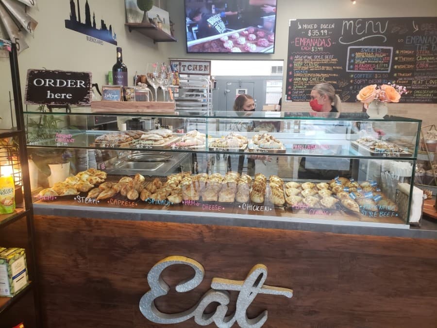 deli case with empanadas