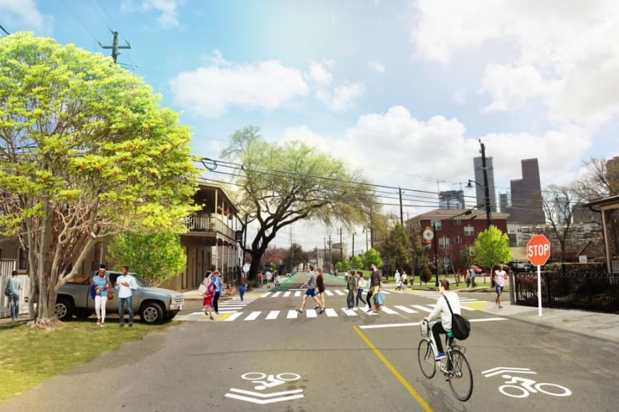 An on-street bikeway on Lubbock Street would transition into a comfort bikeway at the Sabine Street intersection. (Rendering courtesy Old Sixth Ward TIRZ)