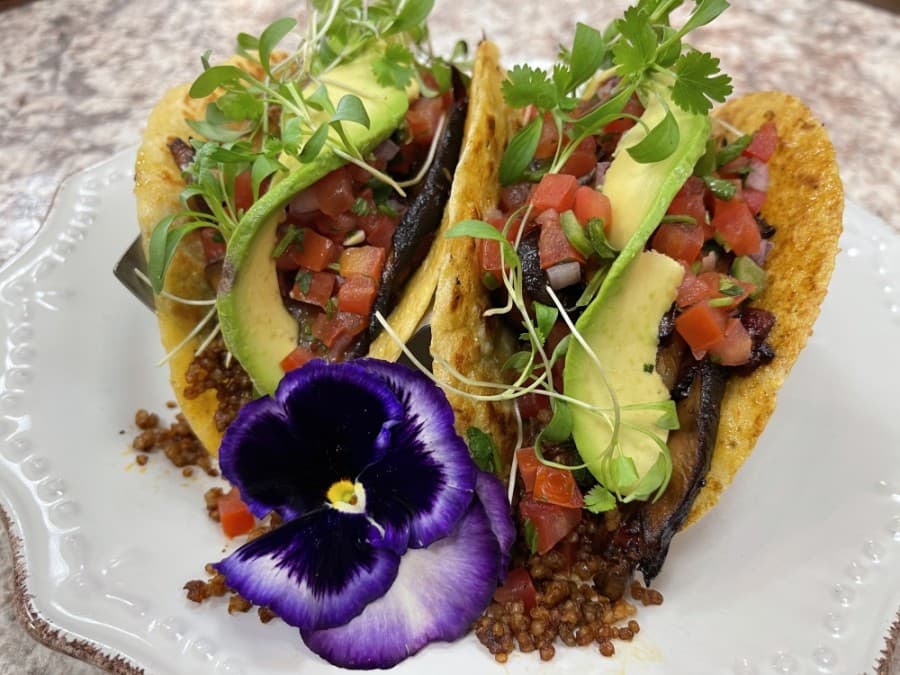 Spicy Quinoa Vegan Tacos ($14)
Two vegan tacos with spicy quinoa, grilled portobello, zucchini, red peppers & onions, topped with pico de gallo, avocado slices and cilantro microgreens (Courtesy Harvest Kitchen & Bakery)