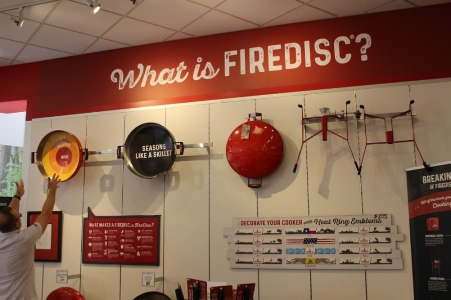 Firedisc cookers fire up fast, season like a cast-iron skillet, clean up quickly with water and are designed to be easily taken apart for travel and storage, the owners said. (Morgan Jones/Community Impact Newspaper)