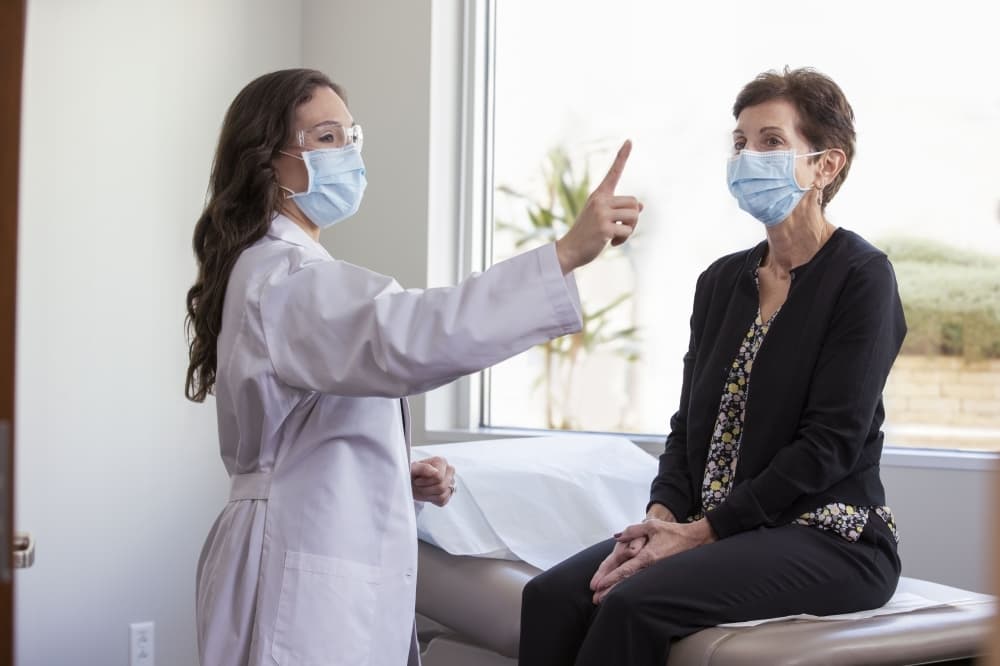 doctor conducting a patient exam