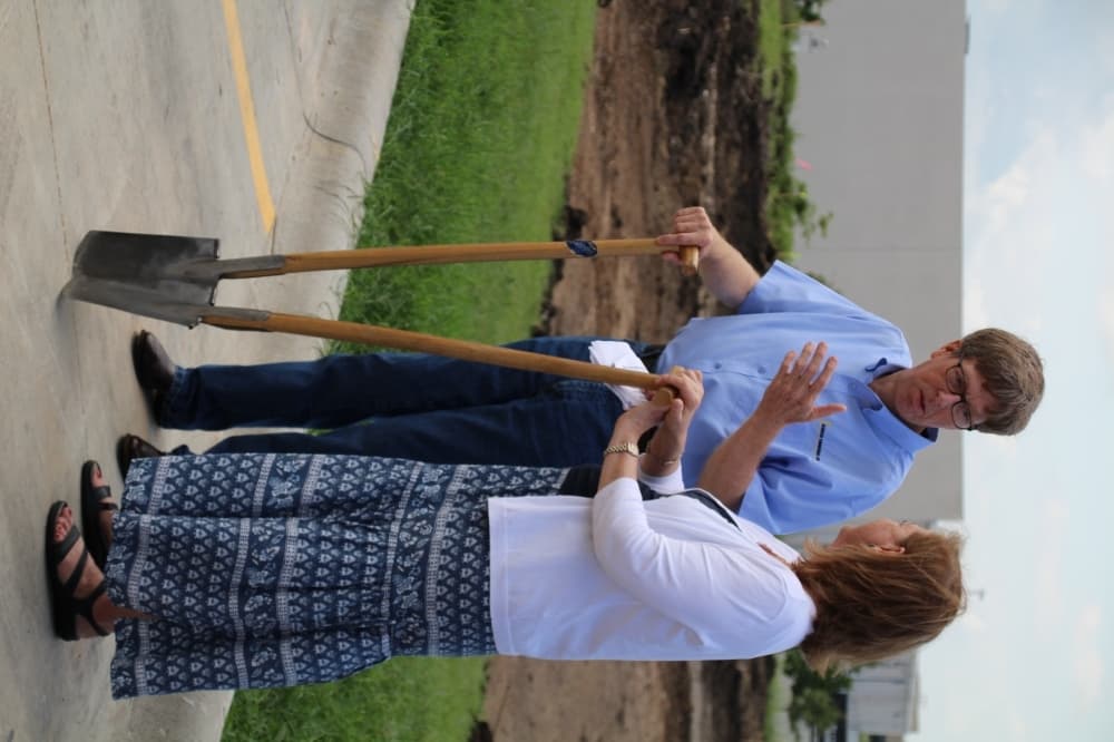 Andrew Cook brought out a hand-forged double shovel for the groundbreaking. The shovel was a gift made as a wedding present for him and Kim. (Megan Cardona/Community Impact Newspaper)