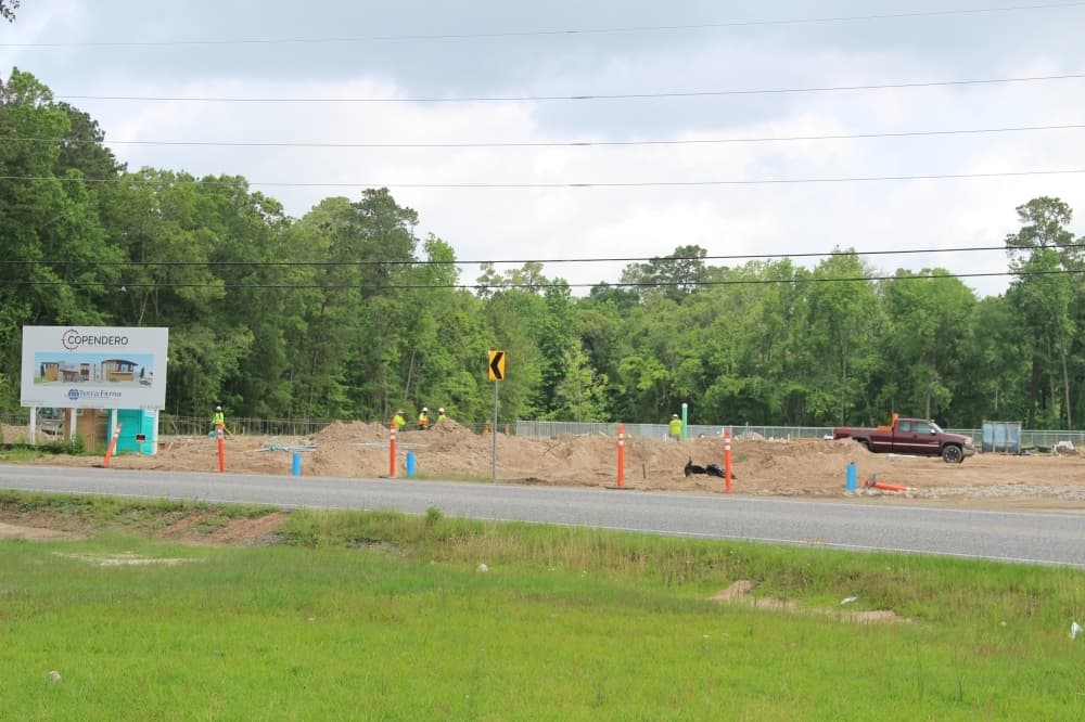 Gun range with two-story building, coffee shop under construction in Oak Ridge North