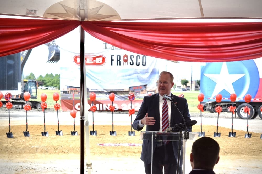 Frisco Mayor Jeff Cheney speaks to those attending the groundbreaking for the city's future H-E-B grocery store. (Matt Payne/Community Impact Newspaper)