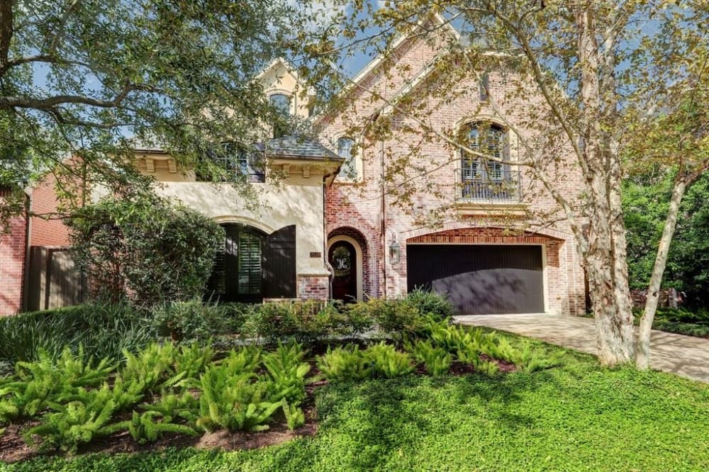2510 McClendon St., Houston: A custom-built Southgate home with elevator capability, formals and oversized living areas, this home additionally features a wood-paneled study with 18-foot beamed ceilings off an entryway. A family room in the home that sits adjacent to a formal dining room and kitchen offers a fireplace with a stone mantle along with French doors that open to a covered patio. A gourmet kitchen is also equipped with SS Bosch appliances, an island with storage, a walk-in pantry and a breakfast bar. 4 bed, 3 full and 1 half bath/5,309 sq. ft. Sold for $1,242,001-$1,425,000 on May 28. (Courtesy Houston Association of Realtors)