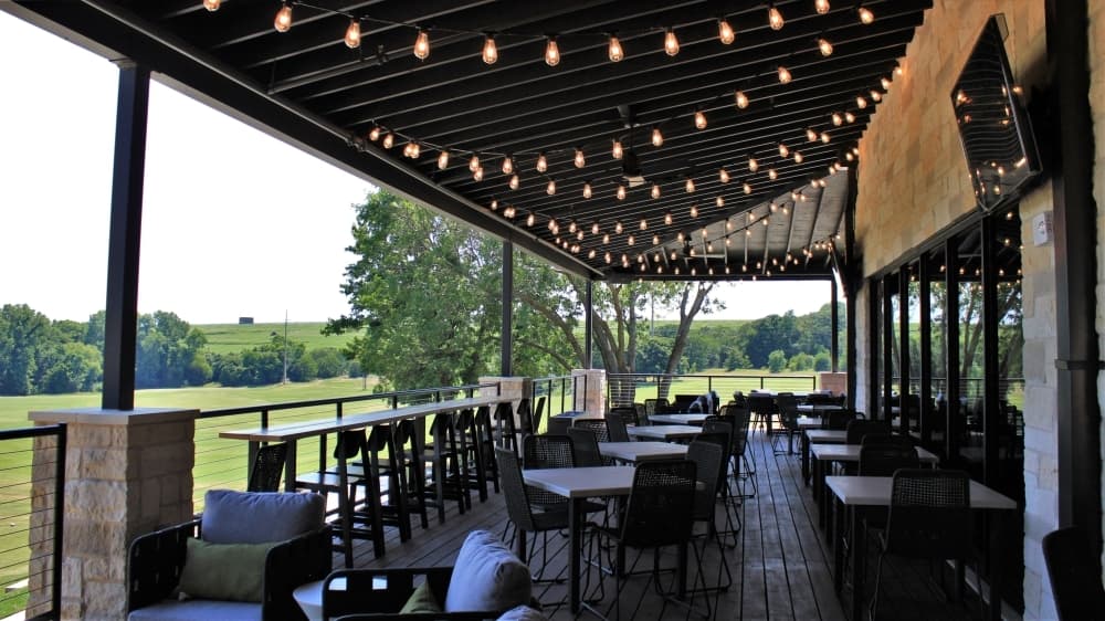 Persimmons Bar & Grill has a view of the golf course. (Sandra Sadek/Community Impact Newspaper)