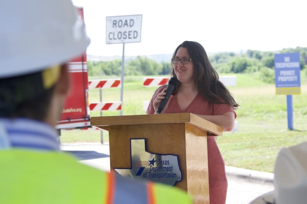 State Rep. Erin Zweiner speaks during the FM 2001 groundbreaking event. (Warren Brown/Community Impact Newspaper)