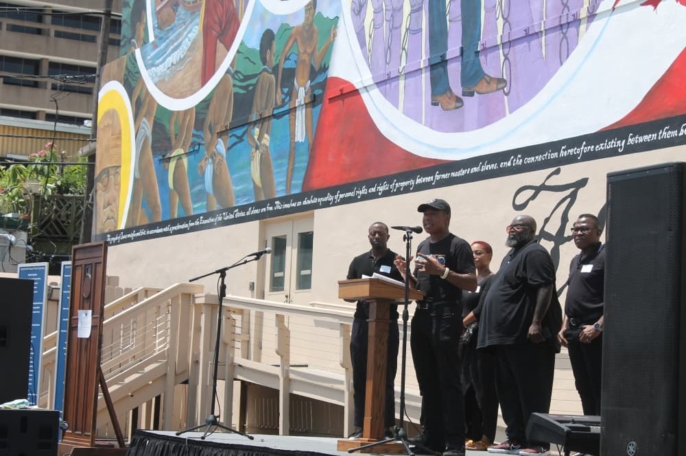 Reginald Adams, one of the mural's creators, emphasized the importance of its role in accurately portraying Black Texans' contributions to American society. (Colleen Ferguson/Community Impact Newspaper)