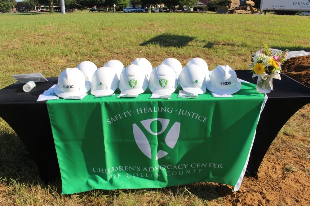 Helmets sit ready for the groundbreaking of the Speese Campus on June 22. (Miranda Jaimes/Community Impact Newspaper)