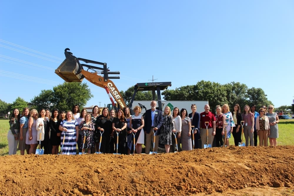 CACC staff take a photo together at the groundbreaking of the new Speese Campus. (Miranda Jaimes/Community Impact Newspaper)