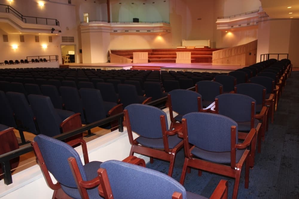 As part of its renovations, the venue traded its burgundy color scheme for cooler blue and gray tones. (Hannah Zedaker/Community Impact Newspaper)