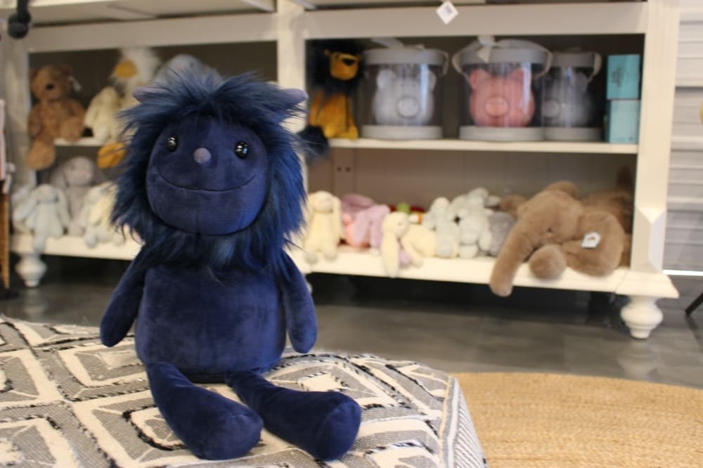 Anisa Shop includes children’s gifts such as the Luda Monster ($25). (Brooke Ontiveros/Community Impact Newspaper)