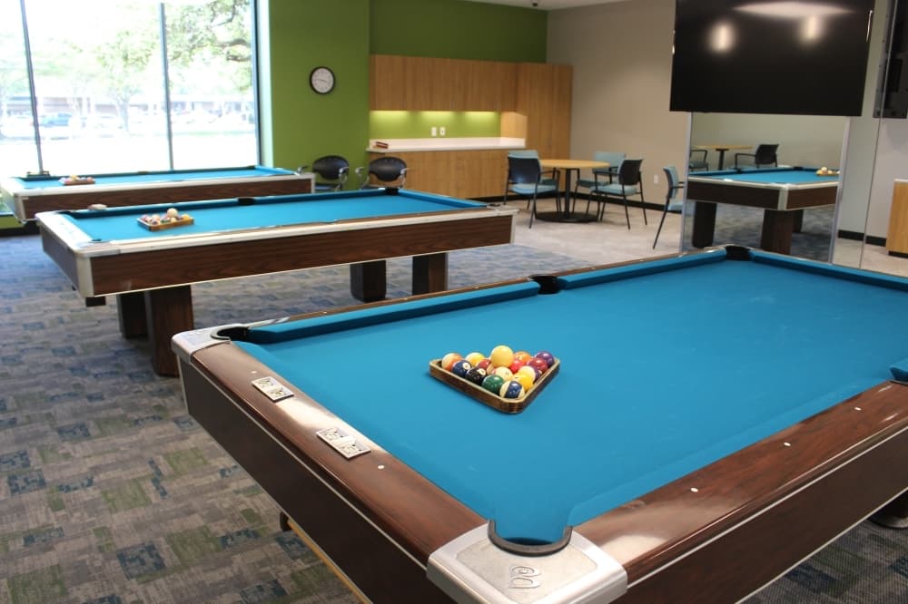 The pool room has been sectioned off to prevent noise from disturbing other visitors. (Olivia Lueckemeyer/Community Impact Newspaper)