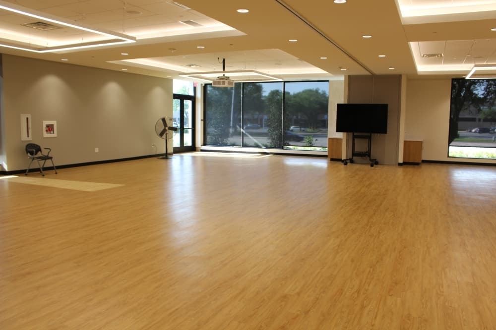 Large multipurpose rooms with movable walls can be used for exercise and dance classes, events and more. (Olivia Lueckemeyer/Community Impact Newspaper)