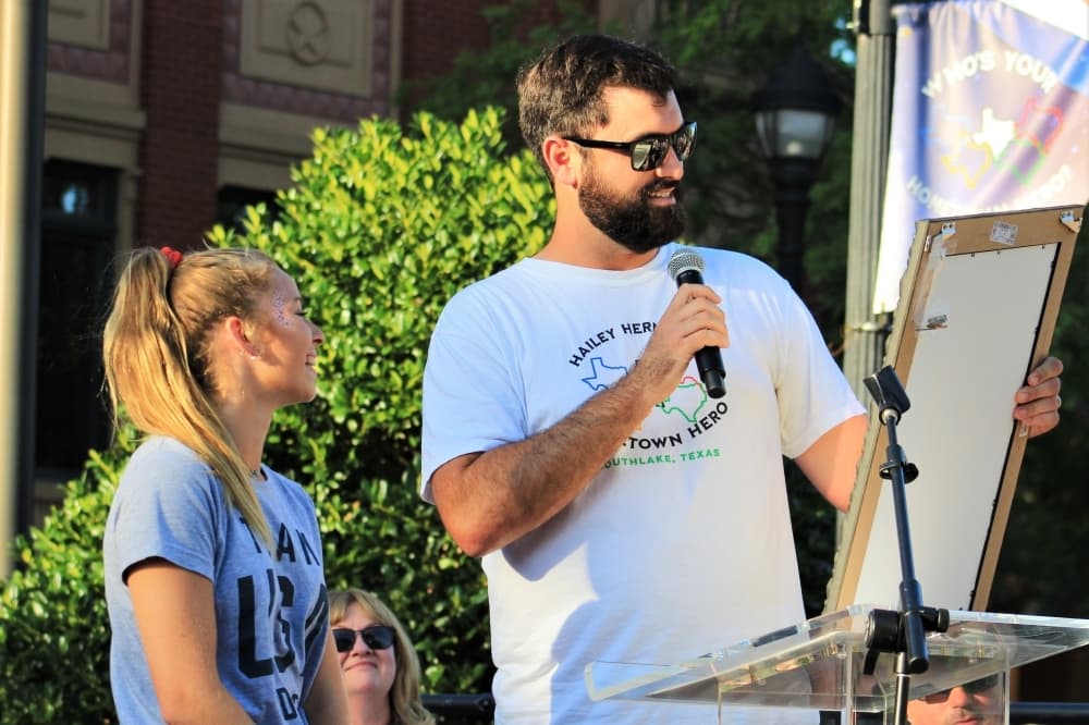 Southlake Mayor John Huffman reads a proclamation making July 9 Hailey Hernandez day. (Sandra Sadek/Community Impact Newspaper)