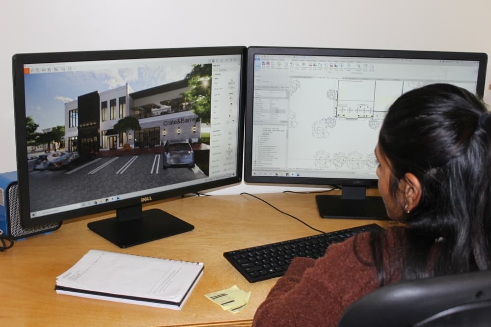 Designer Neha Ambati works on conceptual designs for a Frisco retail development. (Brooklynn Cooper/Community Impact Newspaper)