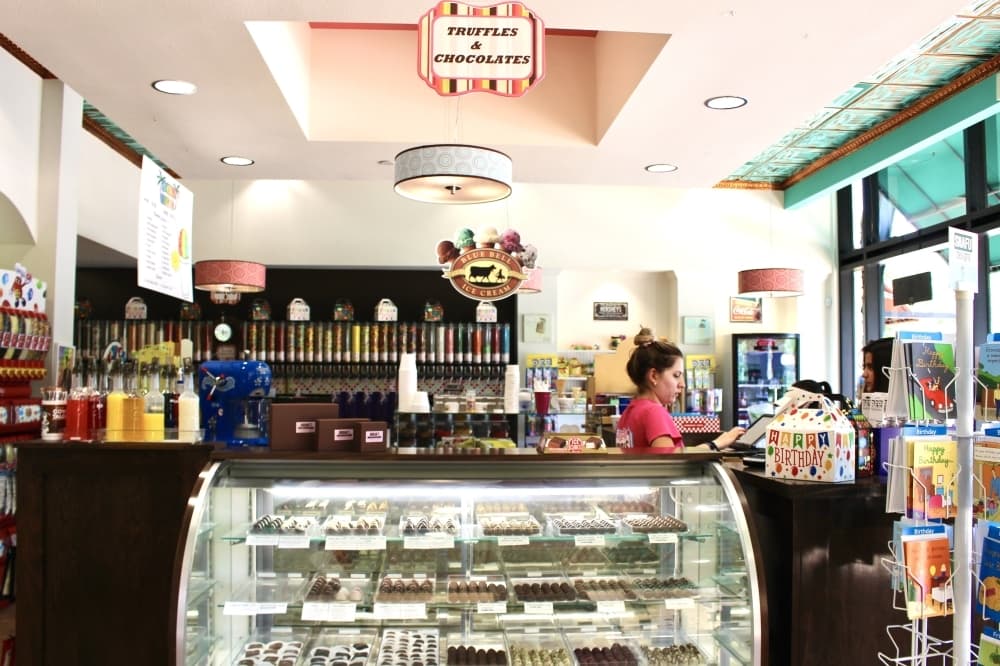Jordan's Sweet Shoppe sells chocolates and truffles. Jordan helps customers who are planning events, such as weddings or graduation parties, purchase large orders of sweets to provide to their guests. (Ally Bolender/Community Impact Newspaper)