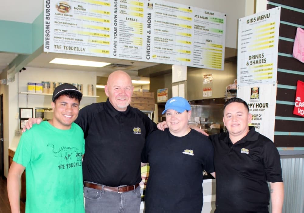 The team at JC's Burger House includes owner Bill Oglesby (second from left).  (Karen Chaney/Community Impact Newspaper)
