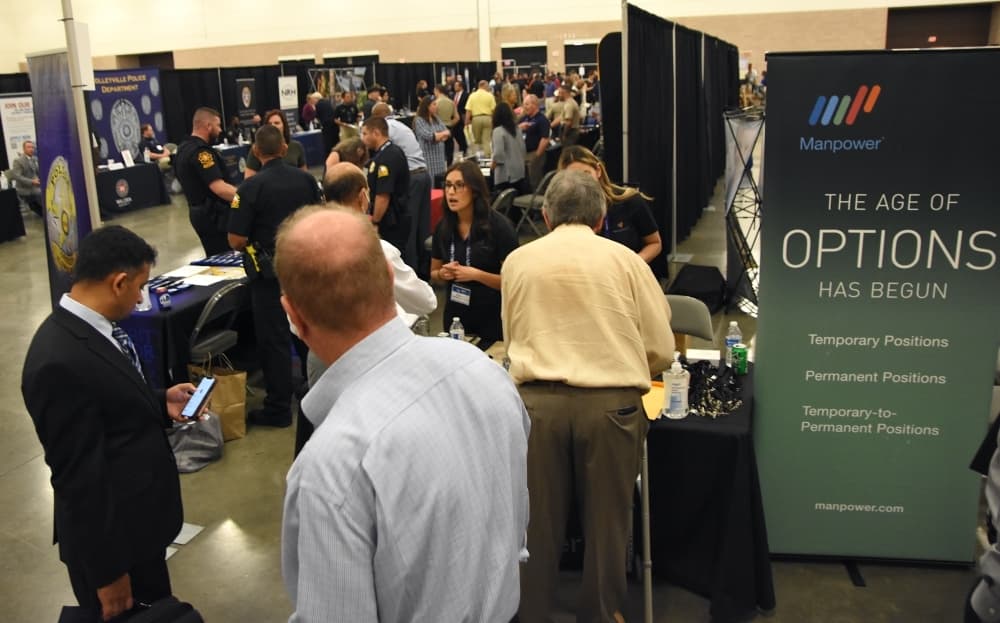 The floor of the Irving Convention Center was busy during the job fair. (Steven Ryzewski/Community Impact Newspaper)