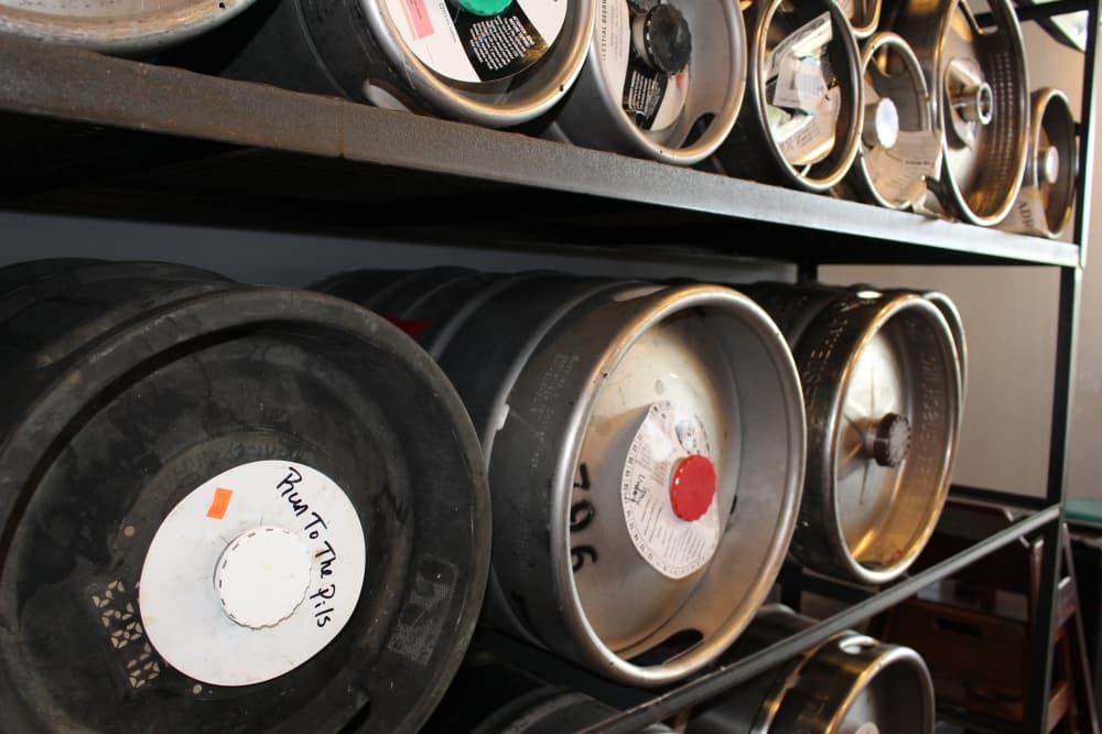 Susan Elbedeiwy, co-owner of Guitars & Growlers, said the restaurant changes about five to six kegs per week. (Brooklynn Cooper/Community Impact Newspaper)