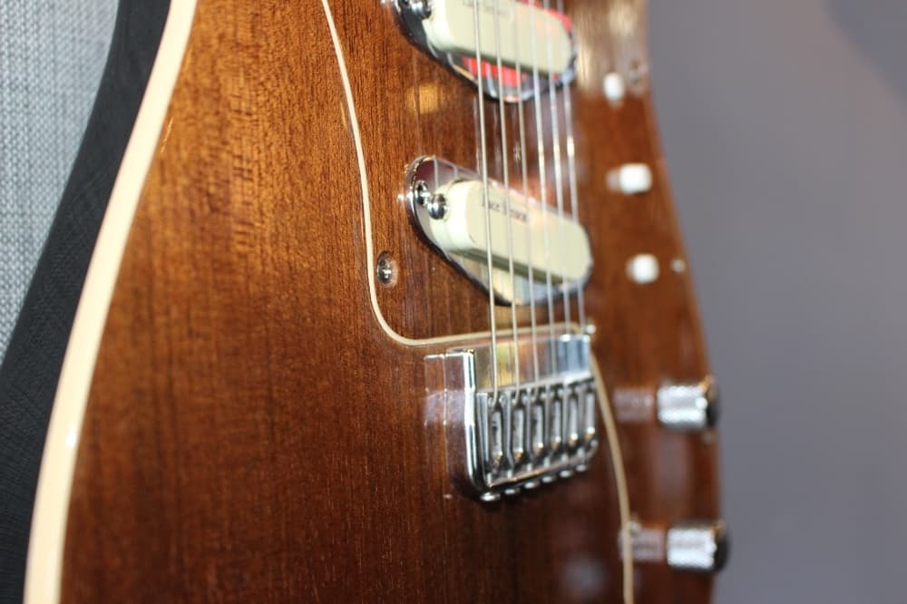 Guitars & Growlers sells custom guitars made by co-owner Rob Baker. (Brooklynn Cooper/Community Impact Newspaper)