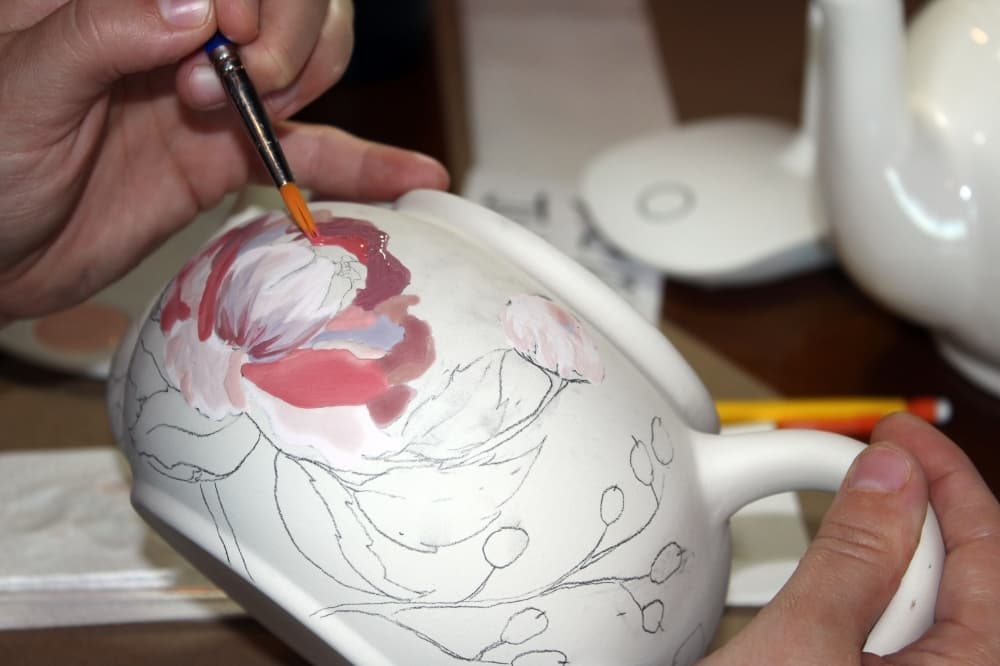 Painters typically spend about an hour painting a piece, some projects take longer. Allow five-seven days for the firing and glazing process. (Karen Chaney/Community Impact Newspaper)