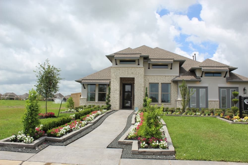 At 2,867 square feet on a 60-foot lot, this Coventry Homes house includes four bedrooms, four full bathrooms, a study and game room. This one-story model has a base price of $570,990. With upgrades and a lakeside location, the home value is $743,728. (Savannah Kuchar/Community Impact Newspaper)
