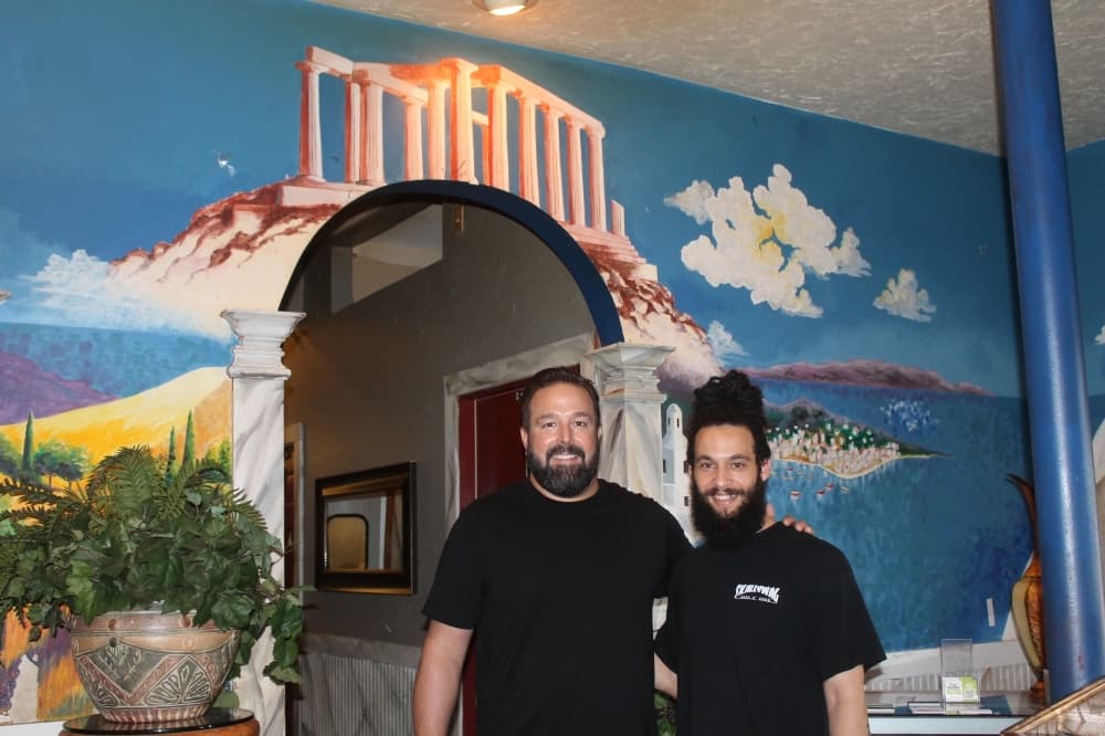 Demetrios Kouloumoundras (left) opened Bakkhus with Zach Buster as co-manager in 2008; Buster has since attended culinary school. (Colleen Ferguson/Community Impact Newspaper)