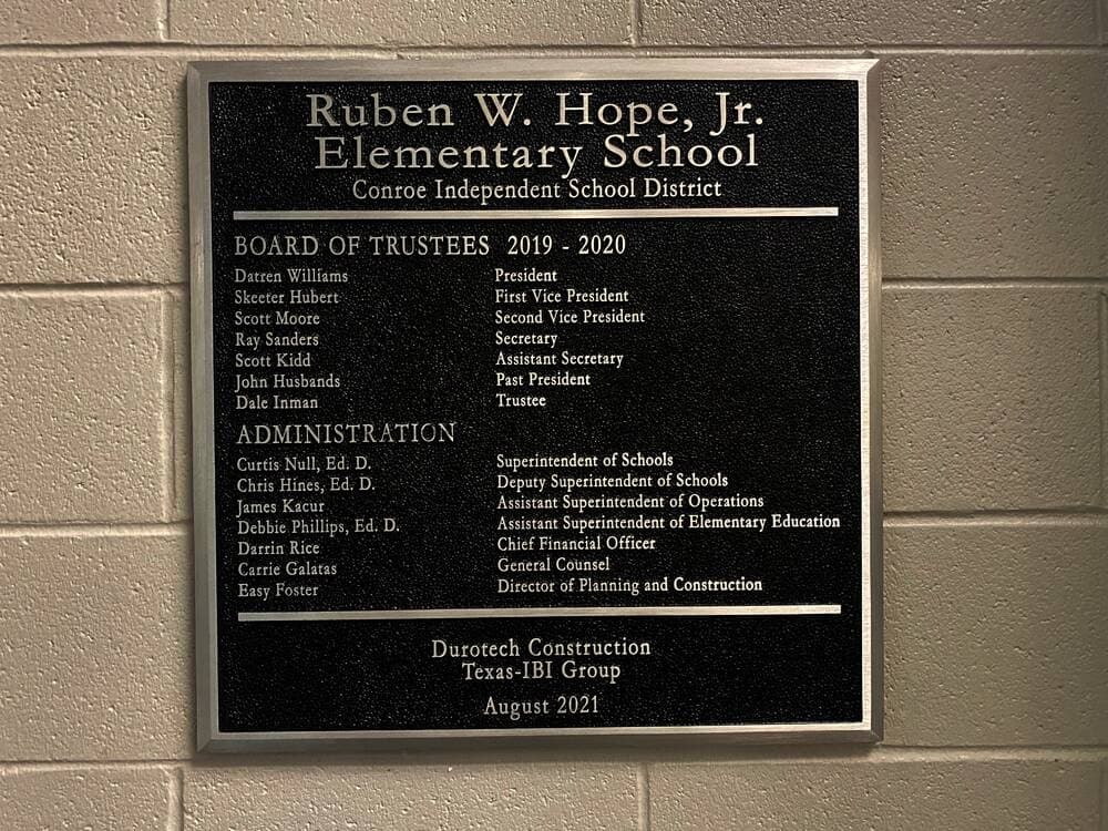 A plaque is in the entryway of every CISD school. (Ally Bolender/Community Impact Newspaper)