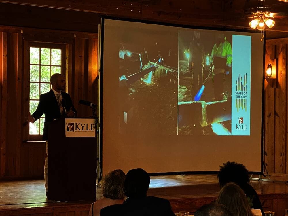 Mayor Travis Mitchell speaks during his 2021 State of the City address, hosted by the Kyle Area Chamber of Commerce. (Eric Weilbacher/Community Impact Newspaper)