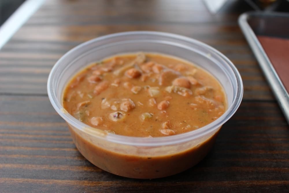 Bexar Barbecue offers sides, like the Bexar Beans ($3.50), in single, pint or quart sizes. (Chandler France/Community Impact Newspaper)