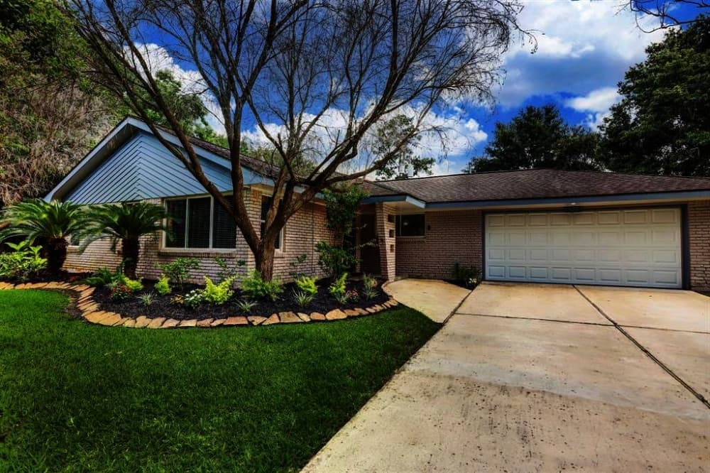 5303 Briarbend Drive, Houston: A Westbury ranch-style home built in 1955 but well-maintained and renovated, this home features the original hardwood flooring in addition to neutral paint colors, crown molding and energy-efficient windows. It also features a large kitchen with silestone counters, subway tile backsplash, custom cabinetry and a stainless steel appliance package with a gas range as well as a dining area off of the kitchen. 3 bed, 2 full bath/1,443 sq. ft. Sold for $325,001-$370,000 on July 13. (Courtesy Houston Association of Realtors)