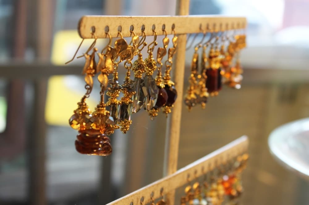Local artists, including painters, glass and jewelry artists sell their creations at Consignment Crush. (Karen Chaney/Community Impact Newspaper)