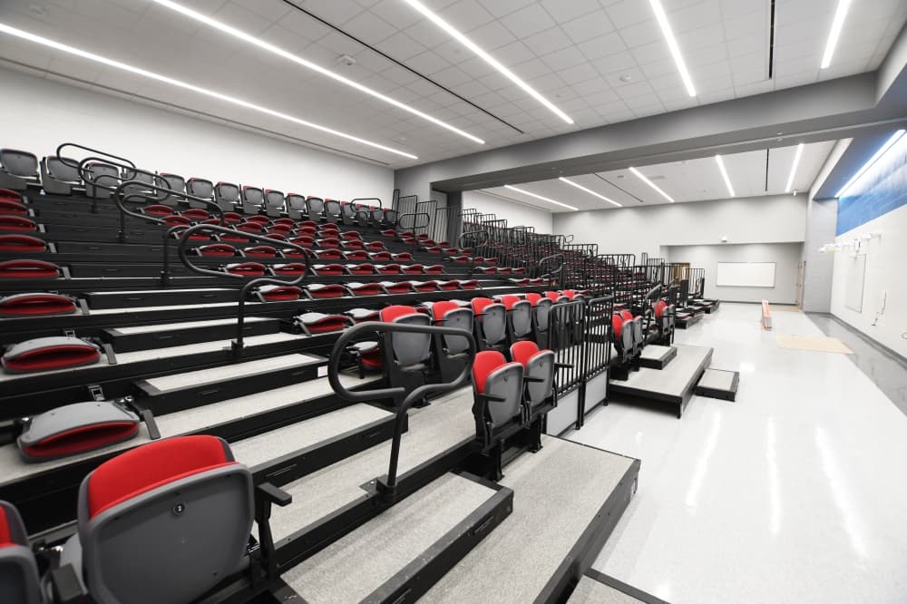Houston ISD made shared-space collaboration a design goal in its 2012 school bond projects. These rooms can hold a lecture hall-style class or have the chairs pushed back for a more interactive space. (Hunter Marrow/Community Impact Newspaper)