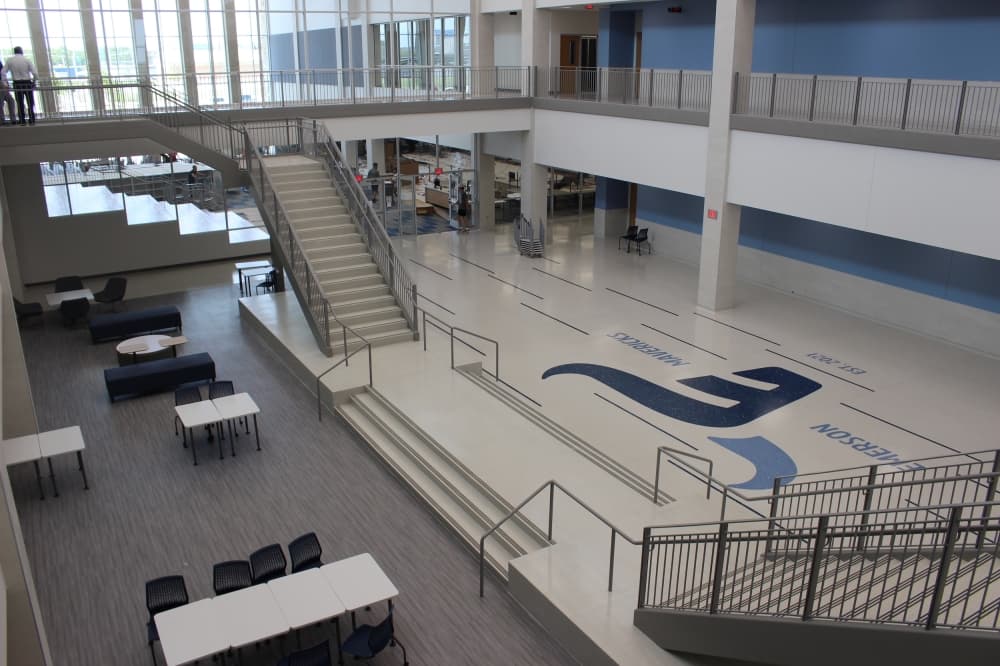 Walking into Emerson High School, students can see their school logo and open collaborative spaces. (Miranda Jaimes/Community Impact Newspaper)