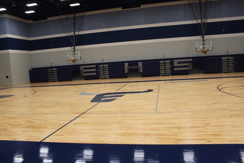 The main gym at the high school features the school's mascot logo.  (Miranda Jaimes/Community Impact Newspaper)