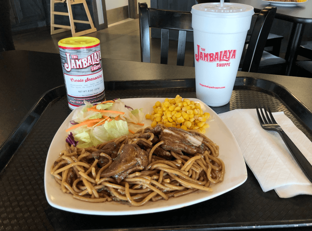 The pastalaya diner ($8.99) comes with chicken and sausage mixed in with spaghetti along with corn and salad on the side. (Andy Yanez/Community Impact Newspaper)