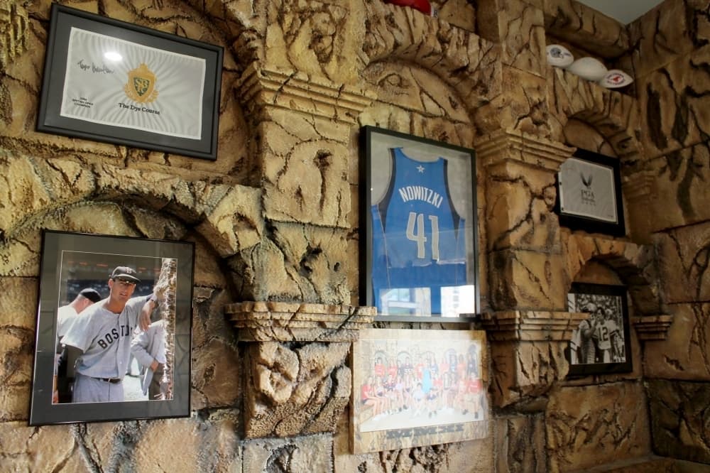 Dr. Buchanan Orthodontics office is adorned with sports memorabilia. (Lindsey Juarez Moncivais/Community Impact Newspaper)