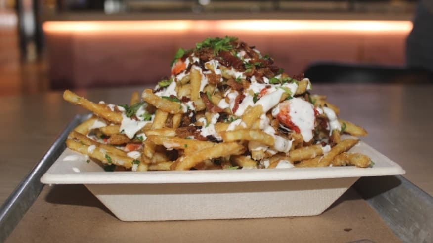 Coastal-style eatery Dock Local serves seafood dishes in Plano
