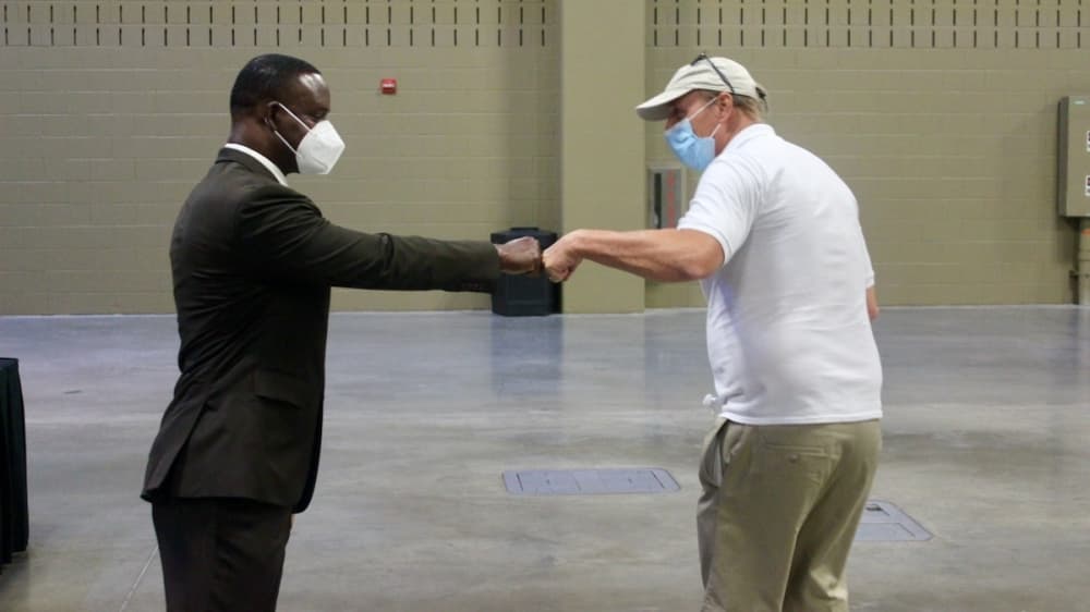 Avery L. Moore, assistant chief at the Dallas Police Department, spoke with residents after his presentation. (Ben Thompson/Community Impact Newspaper)
